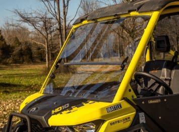 Aftermarket windshield from SuperATV installed on a Can-Am Defender