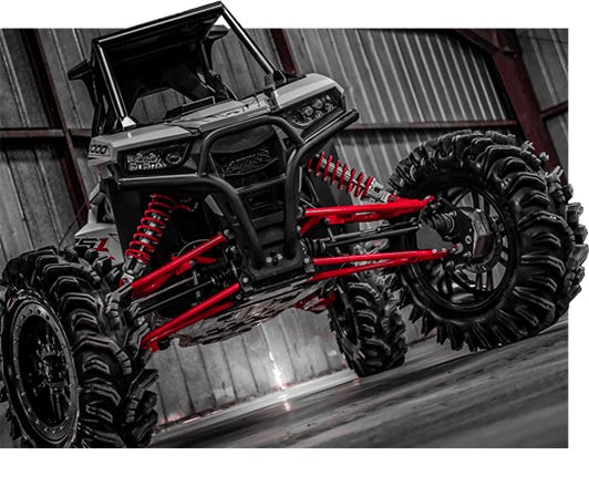 Image of a black and red Polaris RZR with 6" GDP Portal Gear Lifts installed